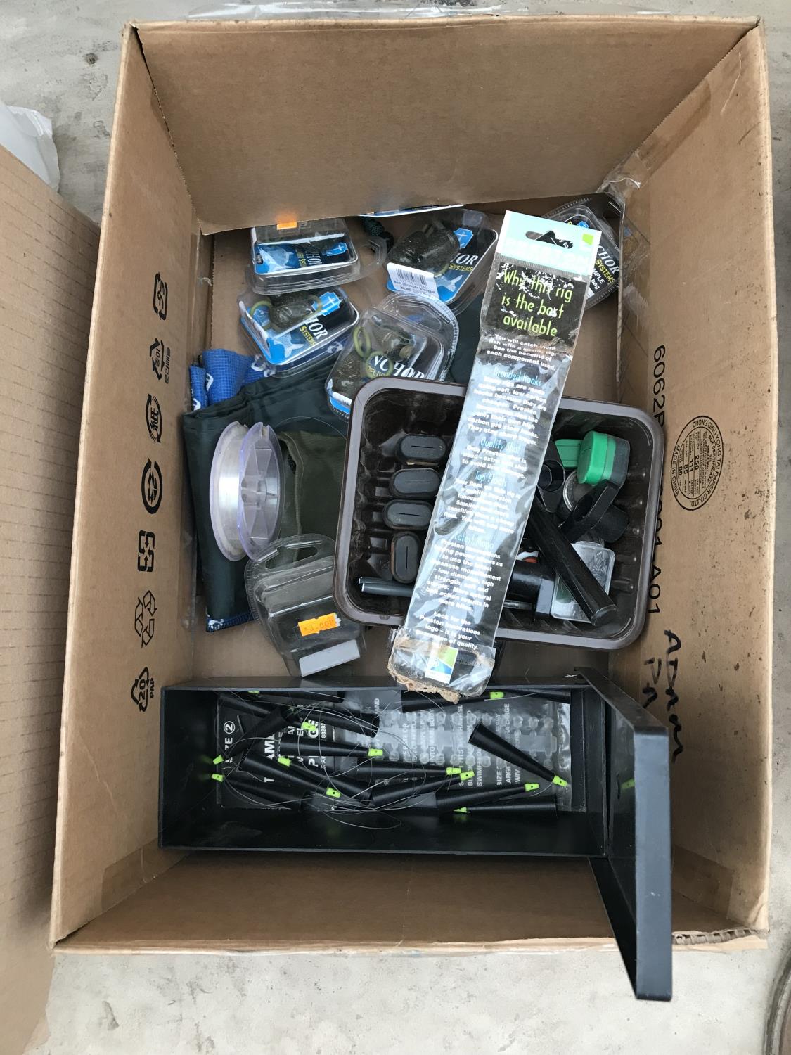 A BOX CONTAINING VARIOUS FISHING TACKLE - WEIGHTS ETC