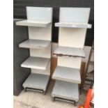 A PAIR OF WHEELED FOUR SHELF SHELVING UNITS WITH BRAKES 43.5CM WIDE.