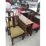 A FORMICA DROP LEAF DINING TABLE AND FOUR OAK DINING CHAIRS