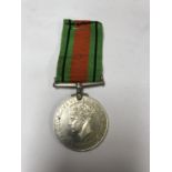 A W.W.II DEFENCE MEDAL