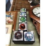 SIX BOXED ART GLASS PAPERWEIGHTS