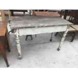 A VINTAGE PINE DROP LEAF KITCHEN TABLE