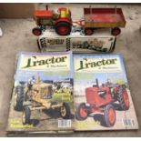 A BOXED CLOCKWORK TINPLATE TRACTOR AND TRAILER MODEL TOGETHER WITH A GROUP OF CLASSIC TRACTOR