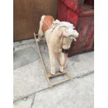 A VINTAGE ROCKING HORSE