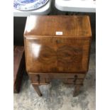 A WALNUT APPRENTICES MINIATURE BUREAU ON STAND