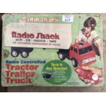 A VINTAGE BOXED 'RADIO SHACK' RADIO CONTROLLED TRACTOR TRAILER TRUCK