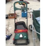 A LAWN RAKER 400W IN WORKING ORDER