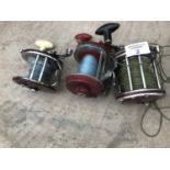 THREE UNBOXED SEA REELS