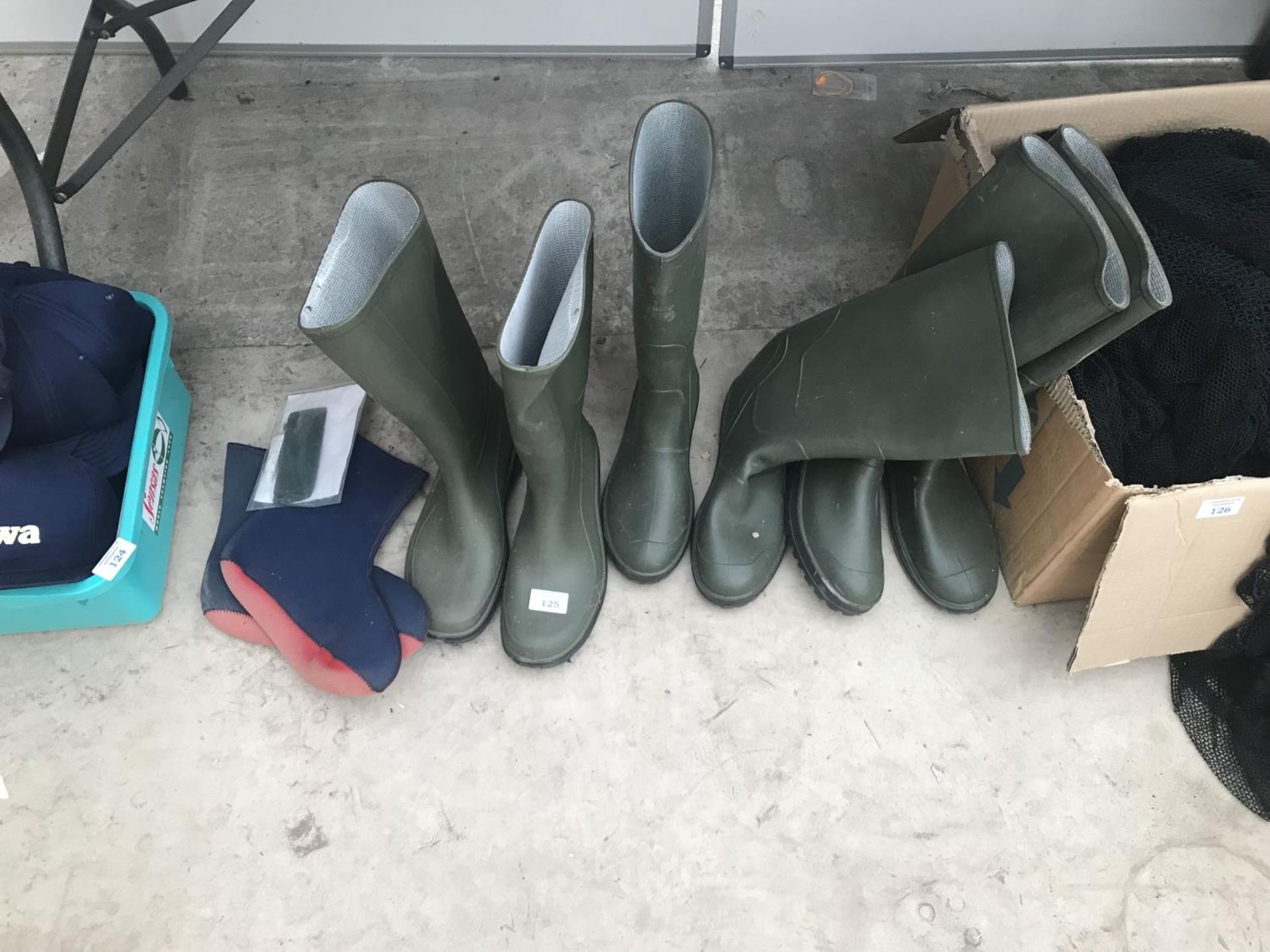 THREE NEW PAIRS OF WELLINGTONS AND A PAIR OF LINERS - SIZES 8, 9 AND 10