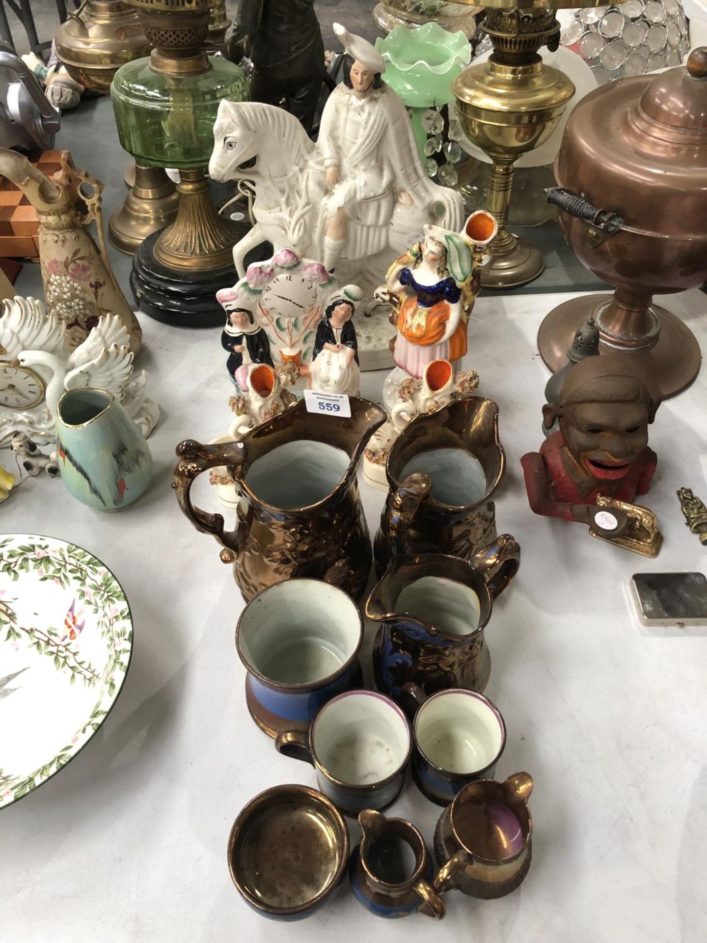 A COLLECTION OF LUSTRE ITEMS TO INCLUDE JUGS AND TANKARDS TOGETHER WITH STAFFORDSHIRE FIGURES ETC