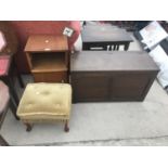 THREE ITEMS - A FOOTSTOOL ON MAHOGANY CABRIOLE SUPPORTS, A TEAK BEDSIDE CABINET AND AN OAK BEDDING