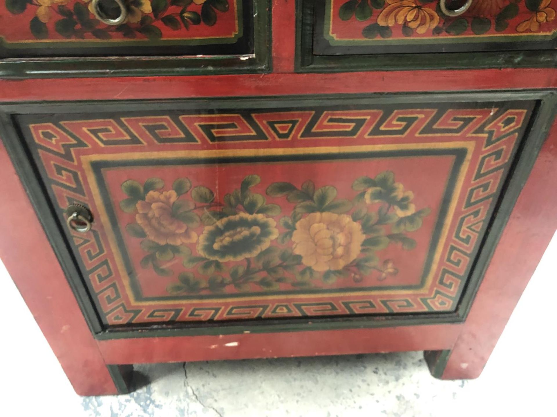 AN ORIENTAL RED LACQUERED CABINET WITH TWO DRAWERS AND LOWER DOOR - Image 3 of 4