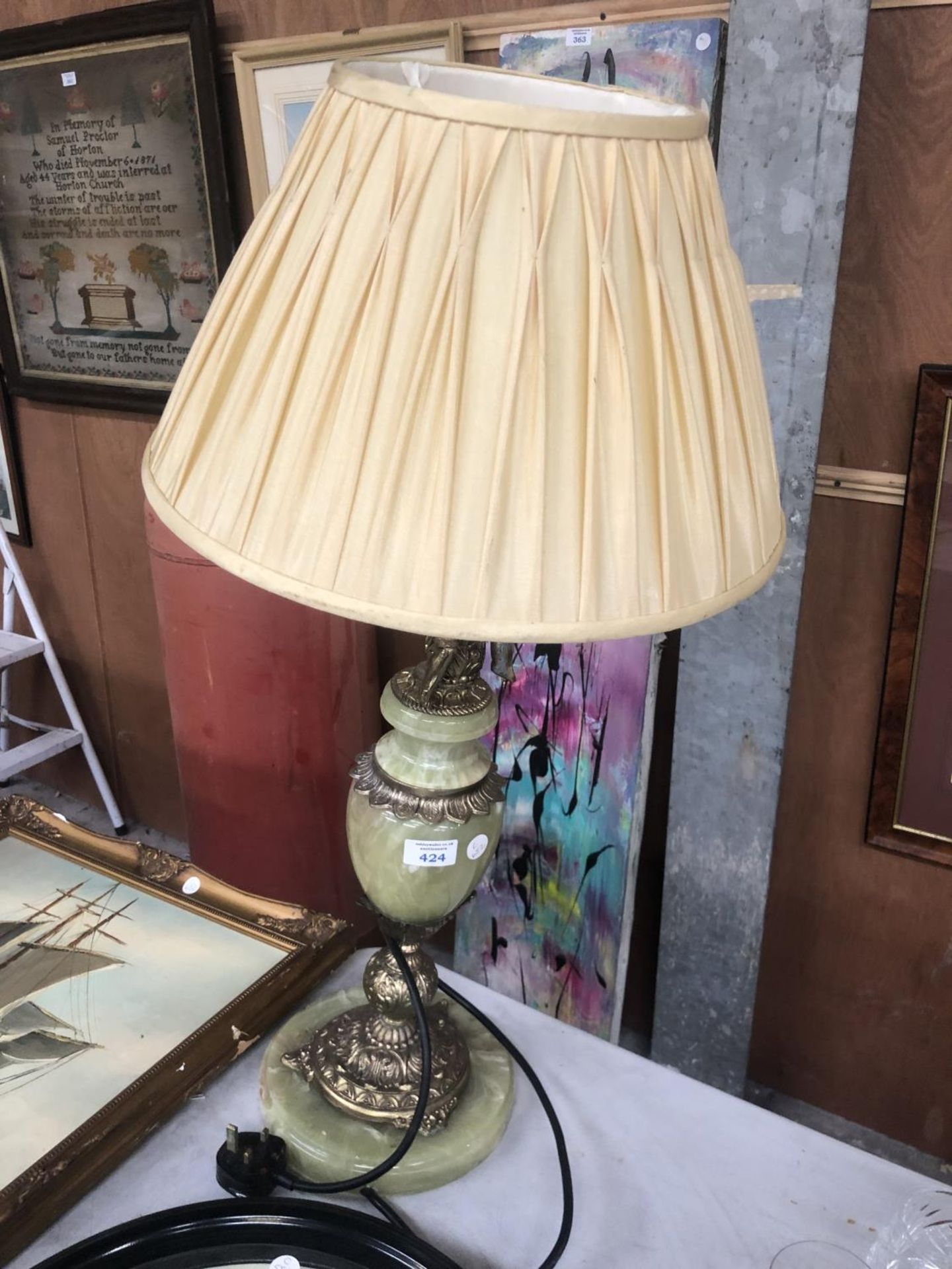 A GREEN ONYX TABLE LAMP WITH SHADE