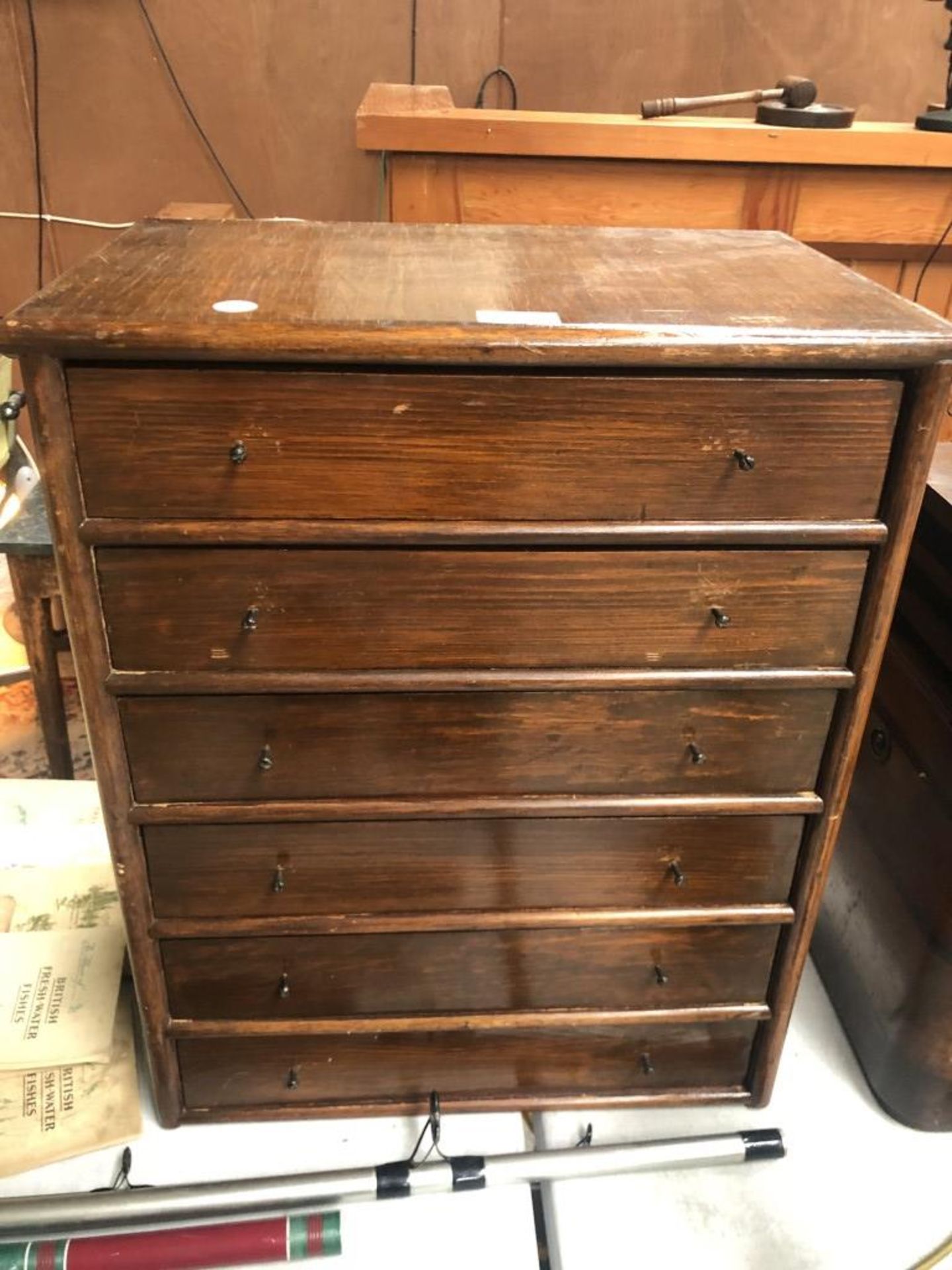 A TABLE TOP CHEST OF SIX DRAWERS