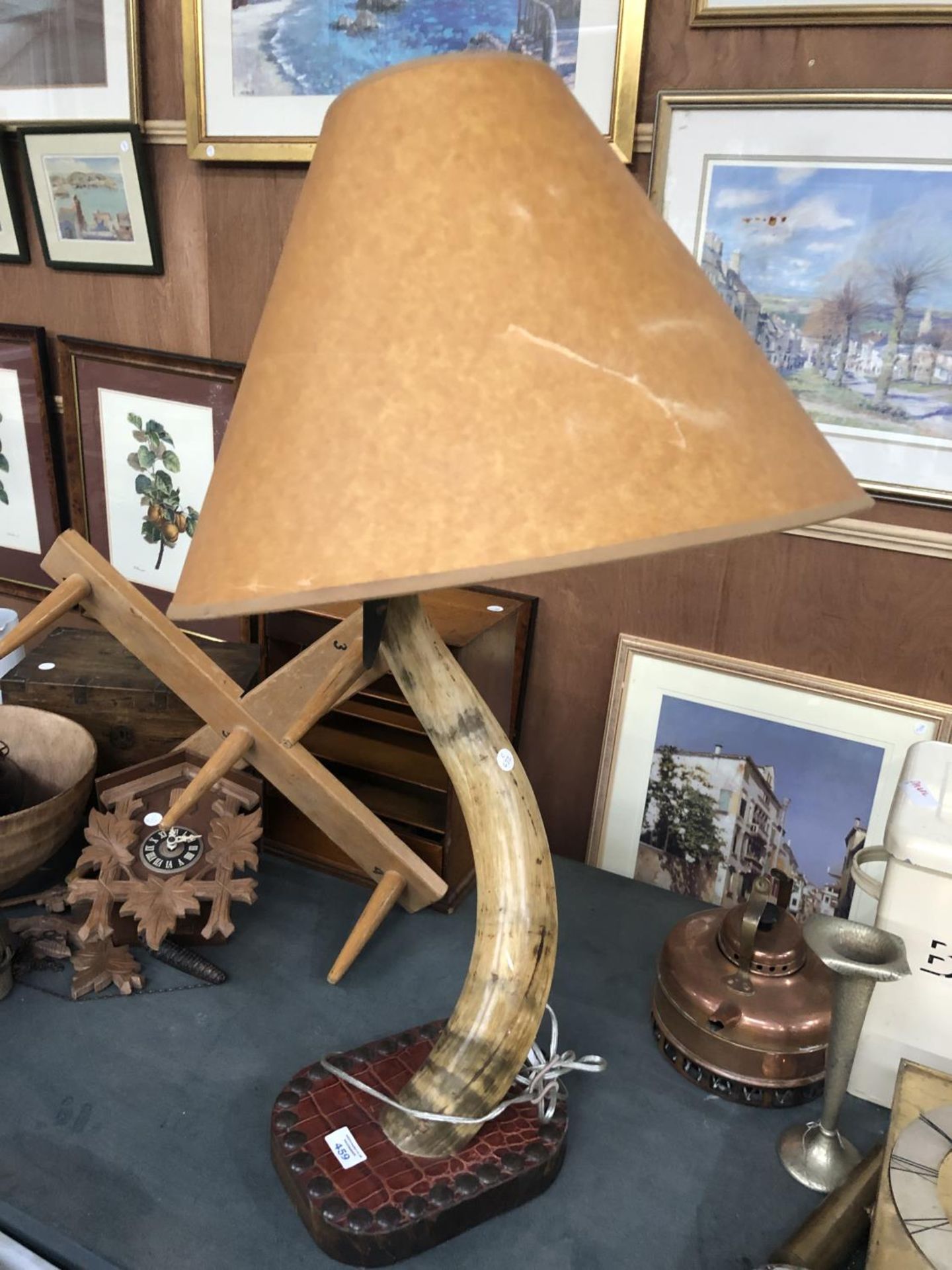 A UNUSUAL WOODEN HORN LAMP WITH SHADE