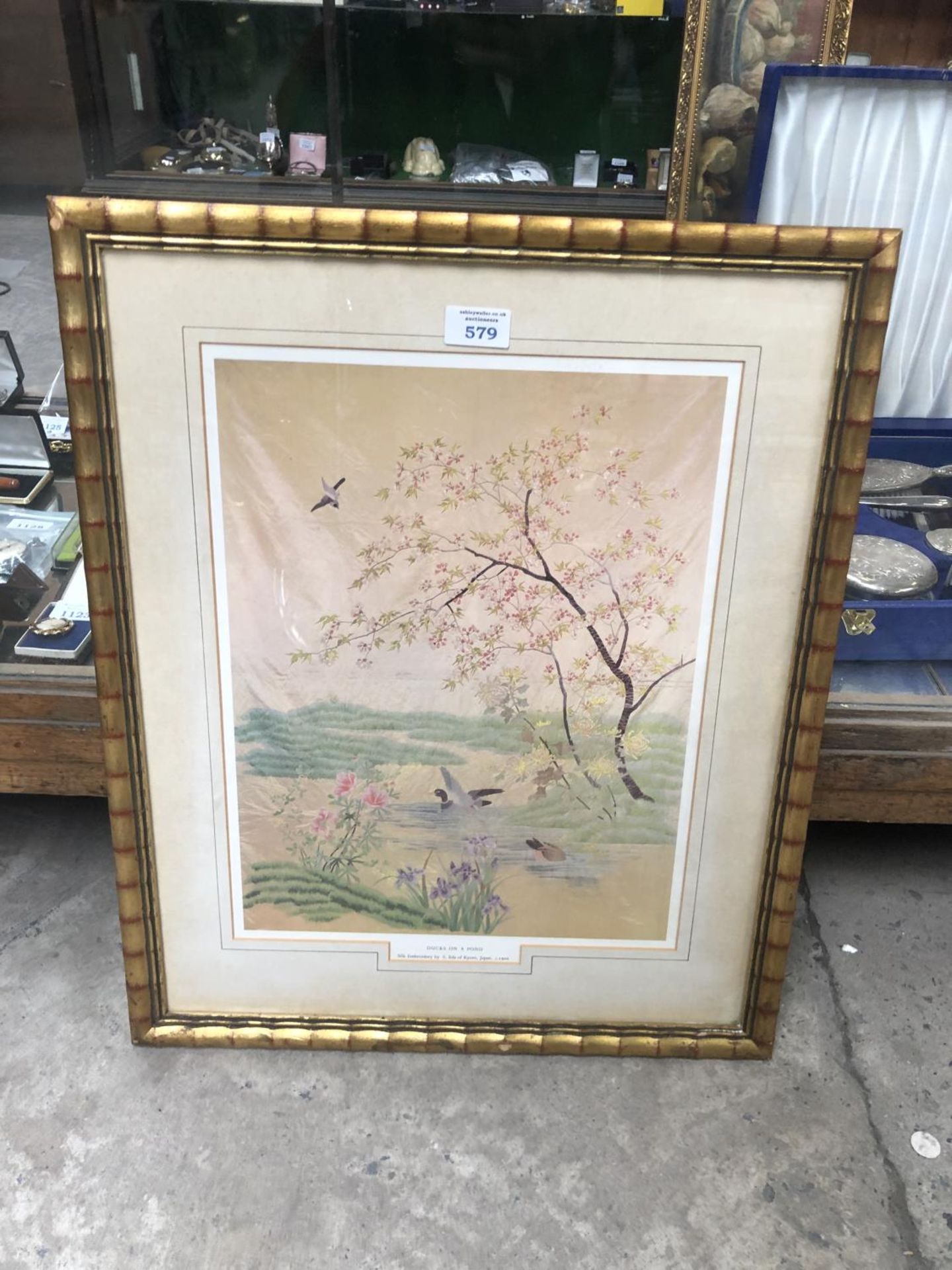 A GILT BAMBOO FRAMED PRINT OF A SILK EMBROIDERY BY S . LIDA OF KYOTO, JAPAN C.1900 'DUCKS ON A POND'