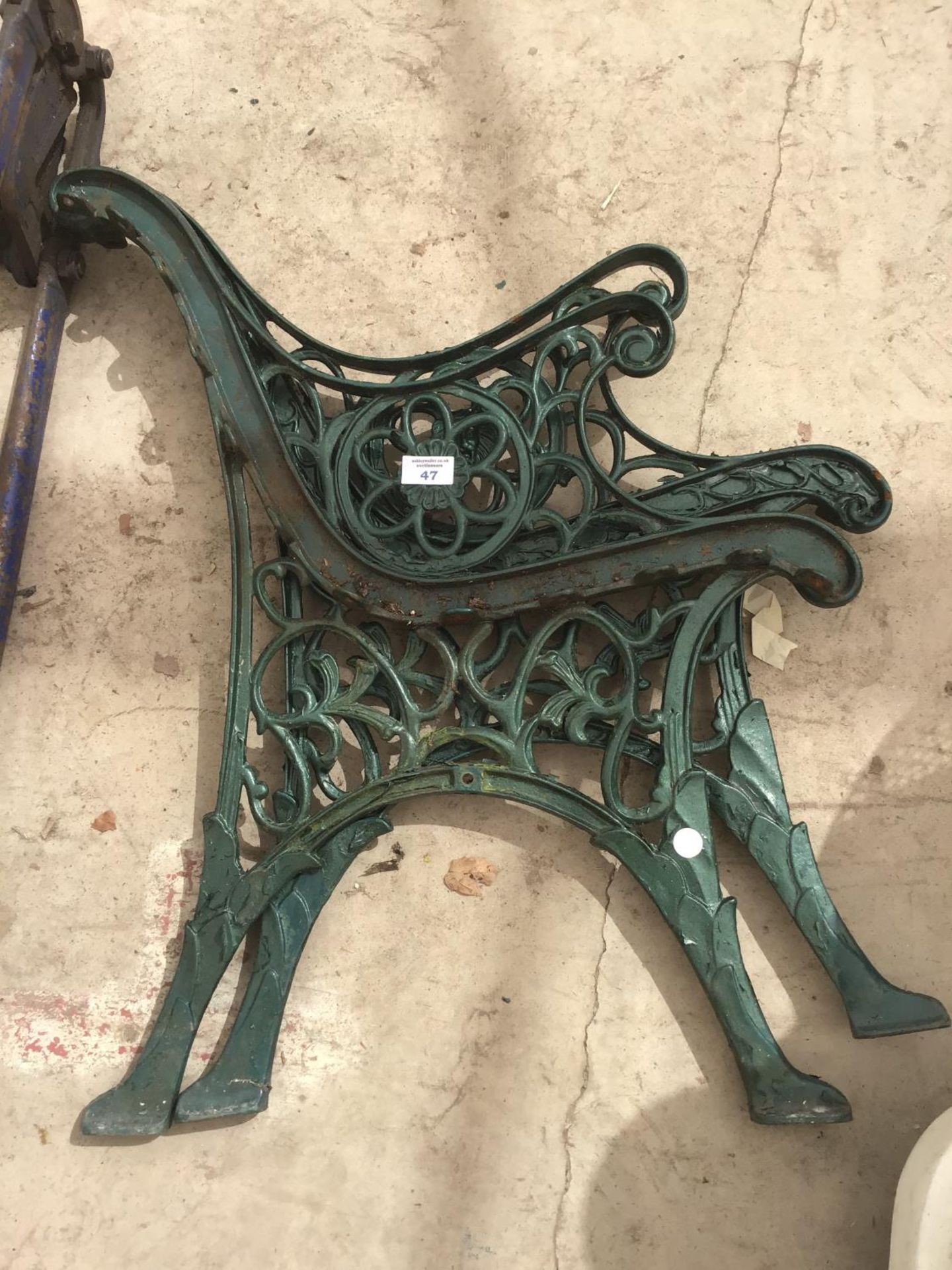 A PAIR OF CAST IRON BENCH ENDS