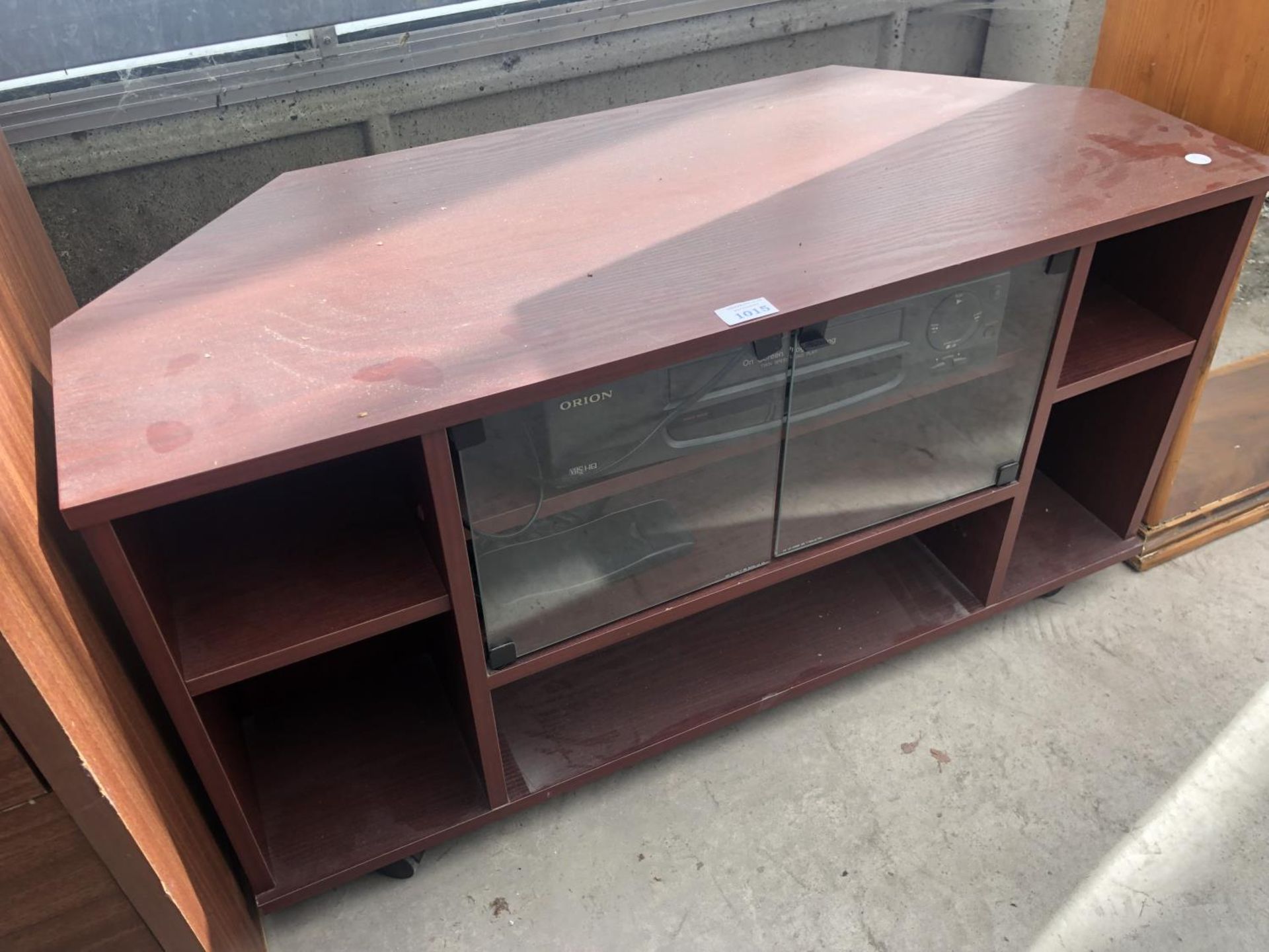 A MAHOGANY EFFECT TV STAND