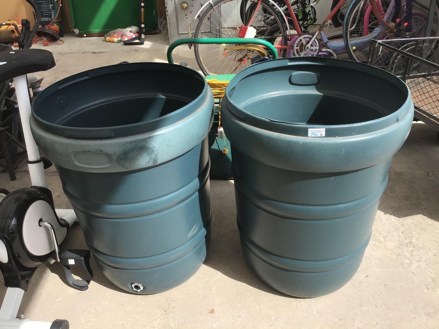 TWO PLASTIC WATER BUTTS WITH TAPS