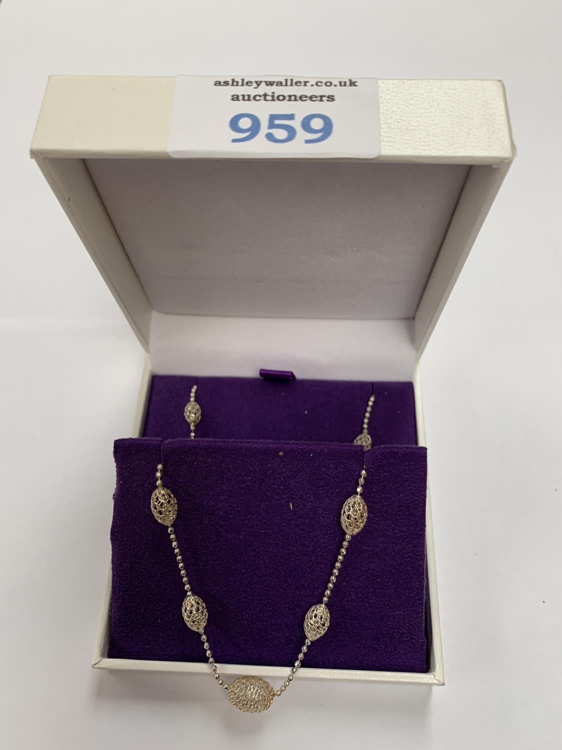 A BOXED SILVER BRACELET AND NECKLACE SET