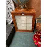 A VINTAGE CHEMISTS SPECIMEN CABINET