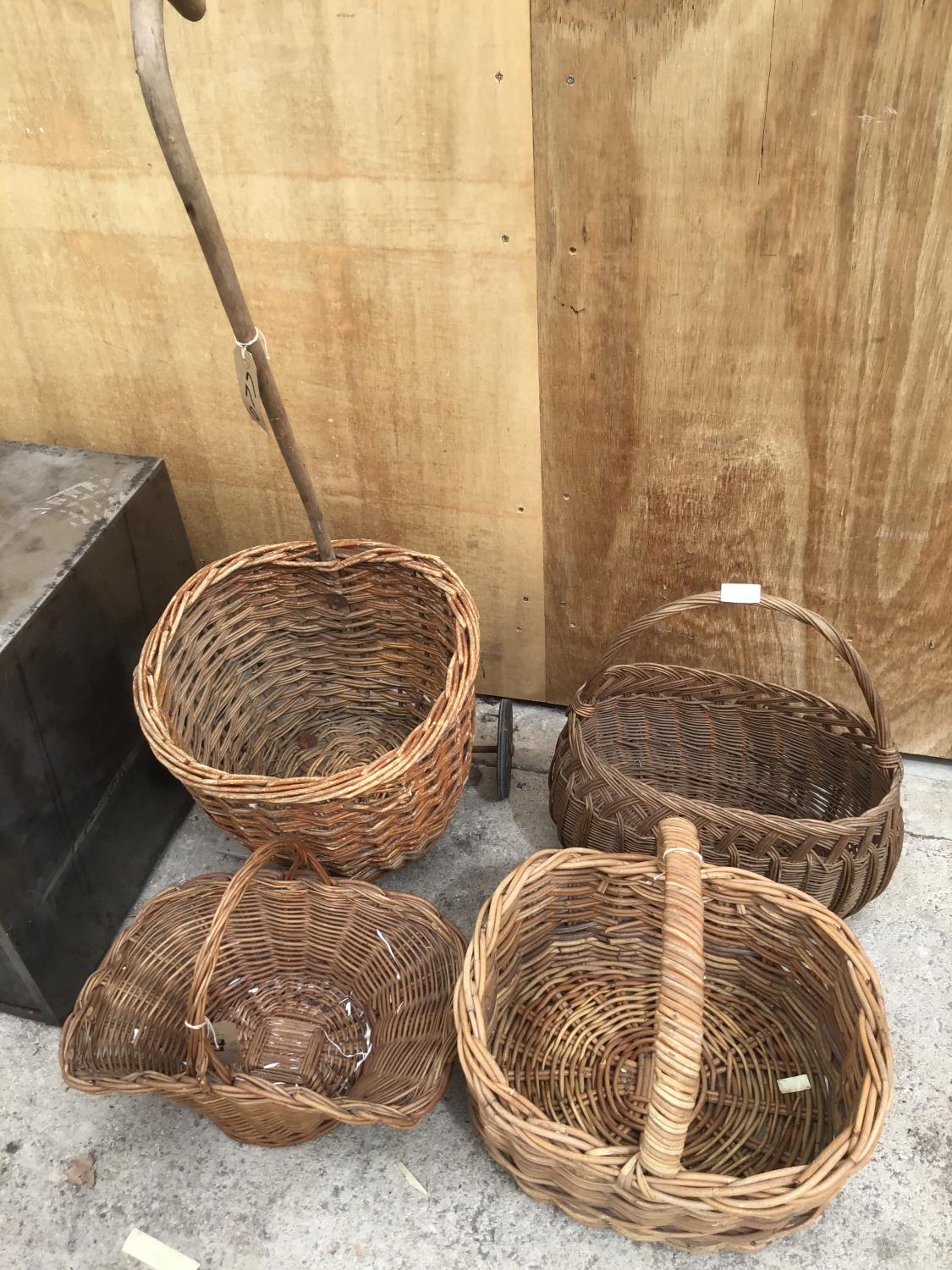 FOUR VINTAGE WICKER ITEMS TO INCLUDE A CANE HANDLED TWO WHEELED SHOPPING TROLLEY