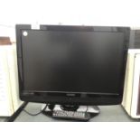 A TECHNIKA 22 INCH TELEVISION WITH DVD PLAYER WITH REMOTE CONTROL IN WORKING ORDER