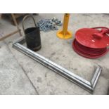 A SILVER COLOURED FIRE SURROUND 134CM X 38CM AND METAL COAL BUCKET (CORROSION TO BASE)