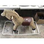A LARGE SOFT TOY ROCKING HORSE