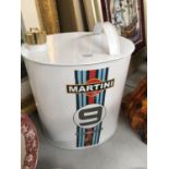 A 'PORSCHE' MARTINI CAN