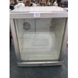 A 'STELLA ARTOIS' COUNTER TOP FRIDGE IN WORKING ORDER