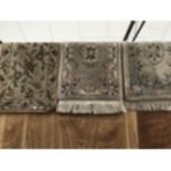 THREE DECORATIVE PATTERNED RUGS, TWO WITH FRINGING