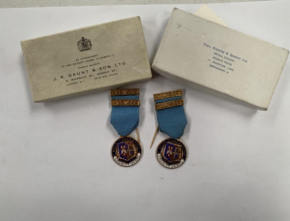 TWO BOXED MASONIC 'WEST LANCASHIRE CHARITY JEWEL' MEDALS