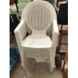 SIX WHITE PLASTIC GARDEN STACKING CHAIRS