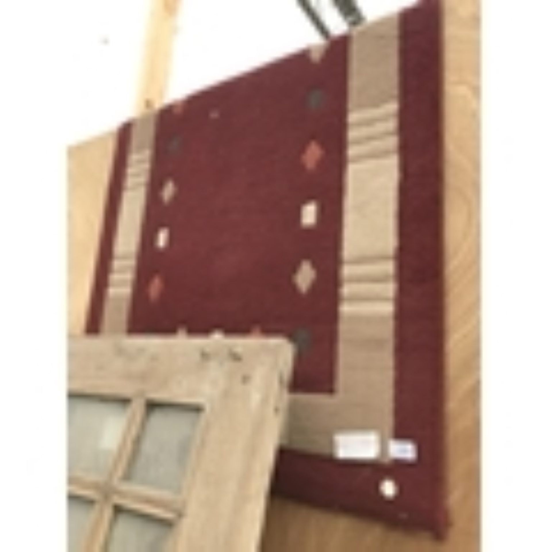 A BEIGE AND BURGUNDY RUG 140CM X 80CM