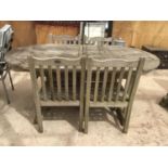 A WOODEN PATIO SET COMPRISING OF A TABLE 180CM X 110CM (SOME ROT SEE PICTURES) AND FOUR CHAIRS