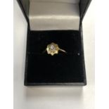 A BOXED 18CT GOLD AND DIAMOND RING