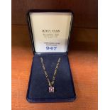 A 9CT GOLD PINK TOPAZ NECKLACE (2.1G)