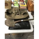 A VINTAGE MILITARY TRENCHING SHOVEL , WITH BAG