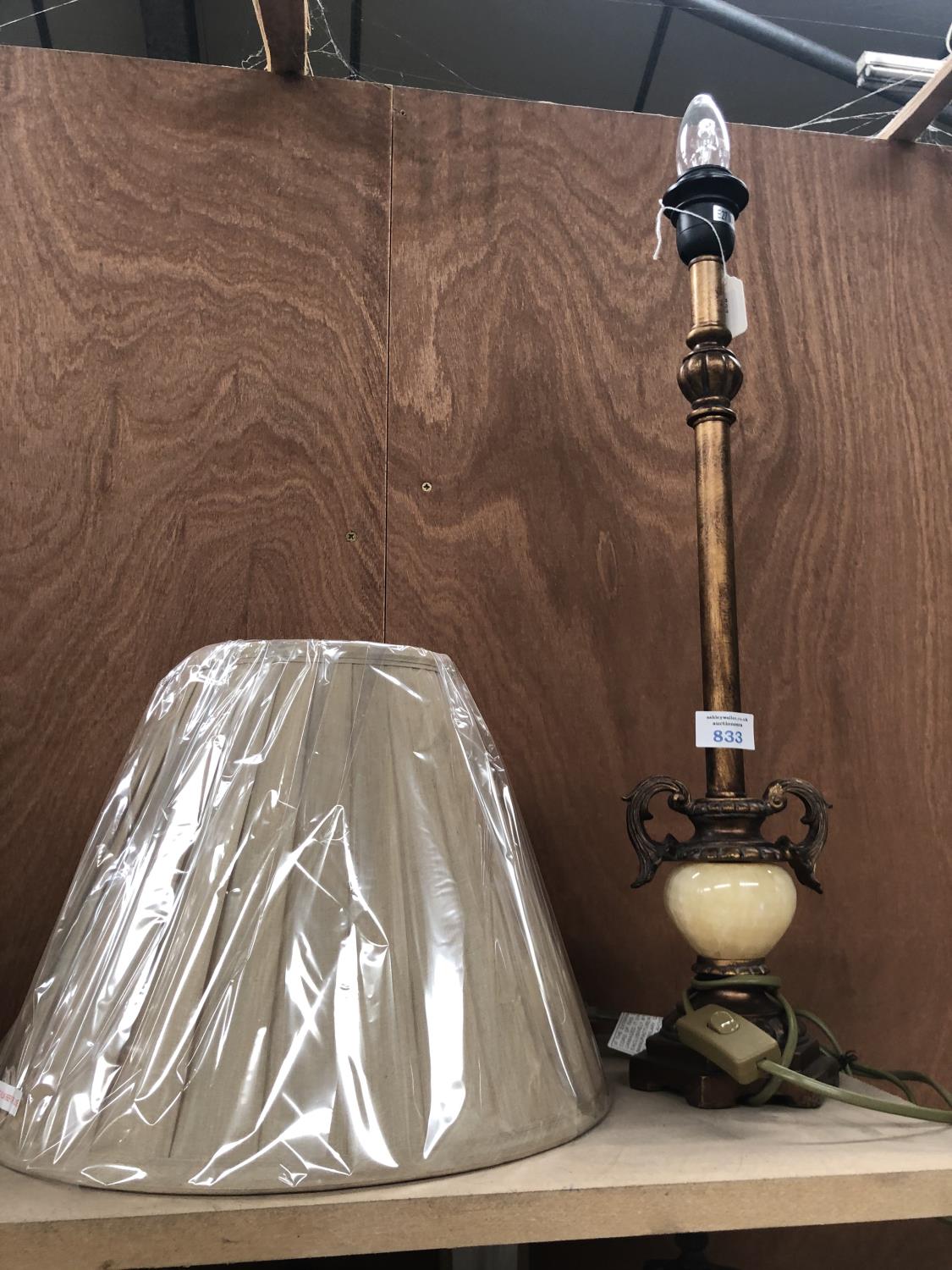 A MARBLE STYLE LAMP WITH NEW SHADE