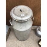 A VINTAGE MILK CHURN WITH LID (HOLE CUT IN LID)