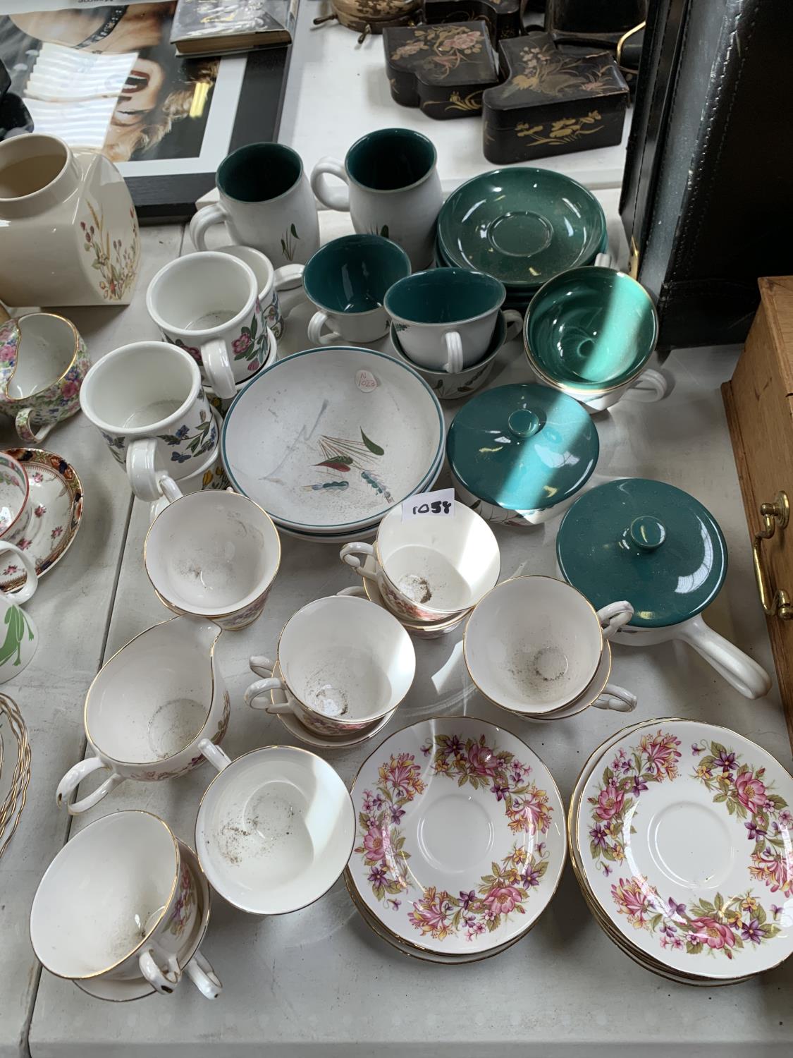 A COLLECTION OF DENBY 'GREENWHEAT' DESIGN DINNER WARE WITH FURTHER CUPS AND SAUCERS