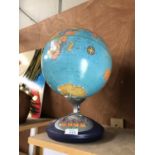 A GLOBE ON STAND WITH BUILT IN SOUND EFFECTS/TALKING