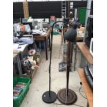 AN OAK STANDARD LAMP AND A BLACK METAL READING LAMP IN WORKING ORDER