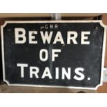 A LARGE CAST METAL 'BEWARE OF TRAINS' G.N.R RAILWAY SIGN