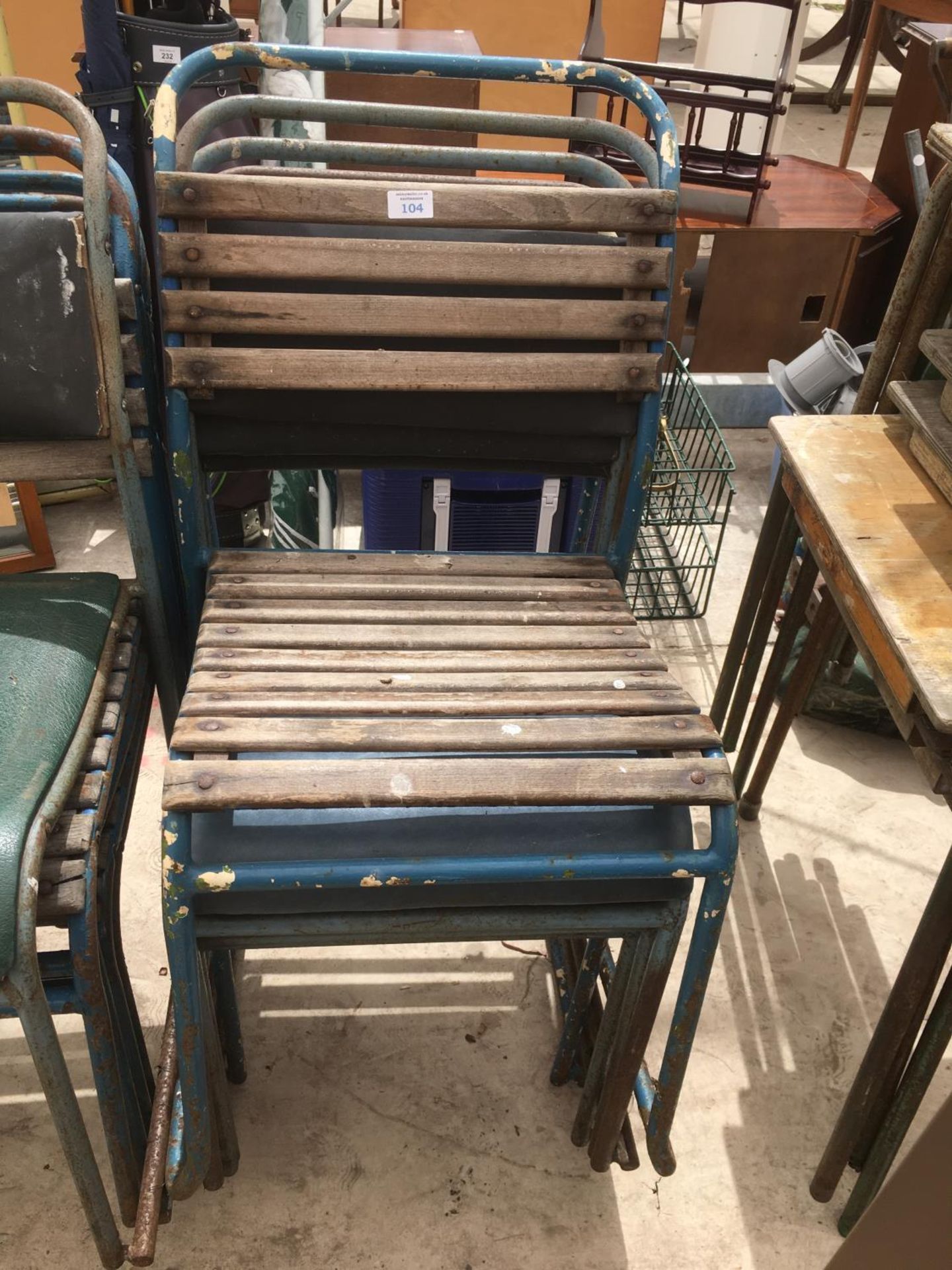 FIVE VARIOUS VINTAGE STACKING CHAIRS
