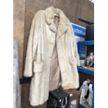 A VINTAGE LADIES LONG FUR COAT