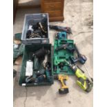 A LARGE COLLECTION OF POWER TOOLS TO INCLUDE DRILLS, SAWS, ANGLE GRINDERS, SPARE BATTERIES ETC ETC