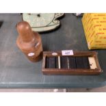 A VINTAGE CASED SET OF DOMINOES AND FURTHER TREEN ITEM (2)