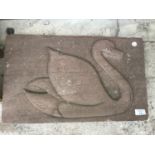 A STONE SWAN PLAQUE